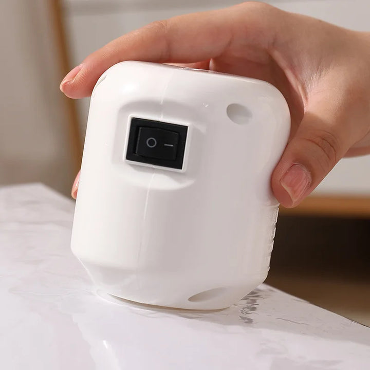 Mini Electric Vacuum Sealer – Compact Pump for Clothes & Food Storage